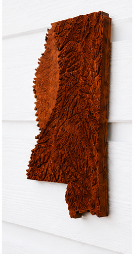 Angled view showing the depth of a carved wood Mississippi map